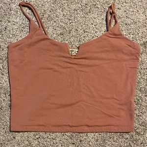 Small. Cropped tank top. NEVER WORN.